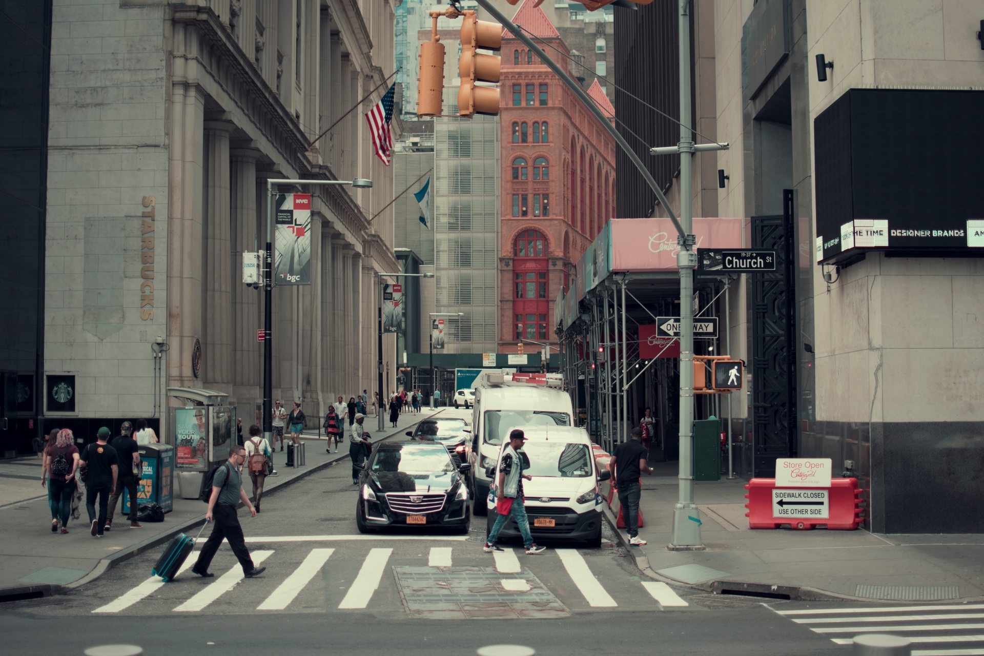 Men crossing the pedestrian walkway